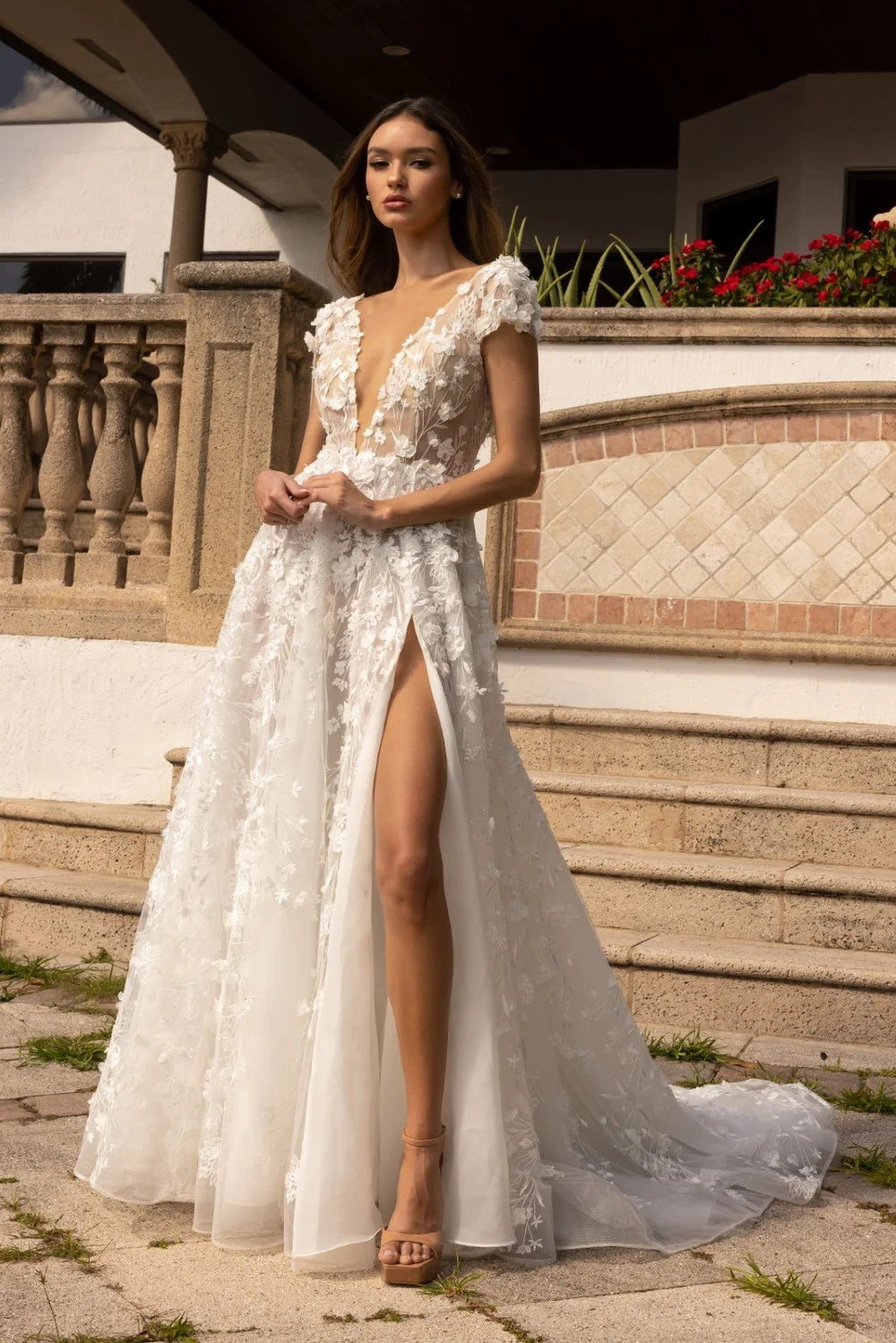Romantic A-Line Gown with Cap Sleeves and Deep V-Neckline